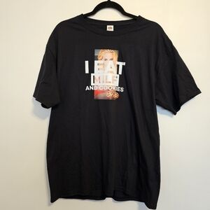 black t-shirt in size large with the phrase "I eat milf and cookies
